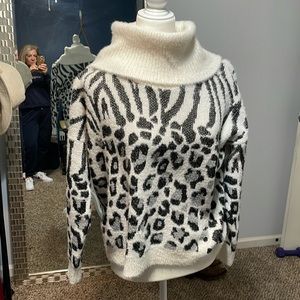 New Directions Size L. White and Black leopard print Fuzzy Sweater